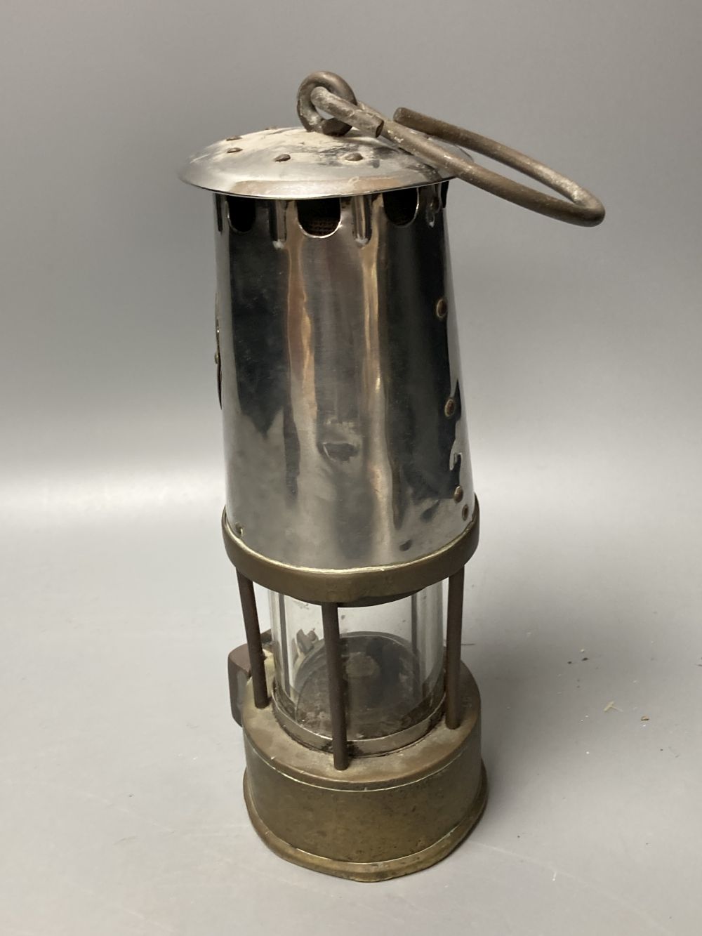 Three brass and chrome miners lamps, 25cm high